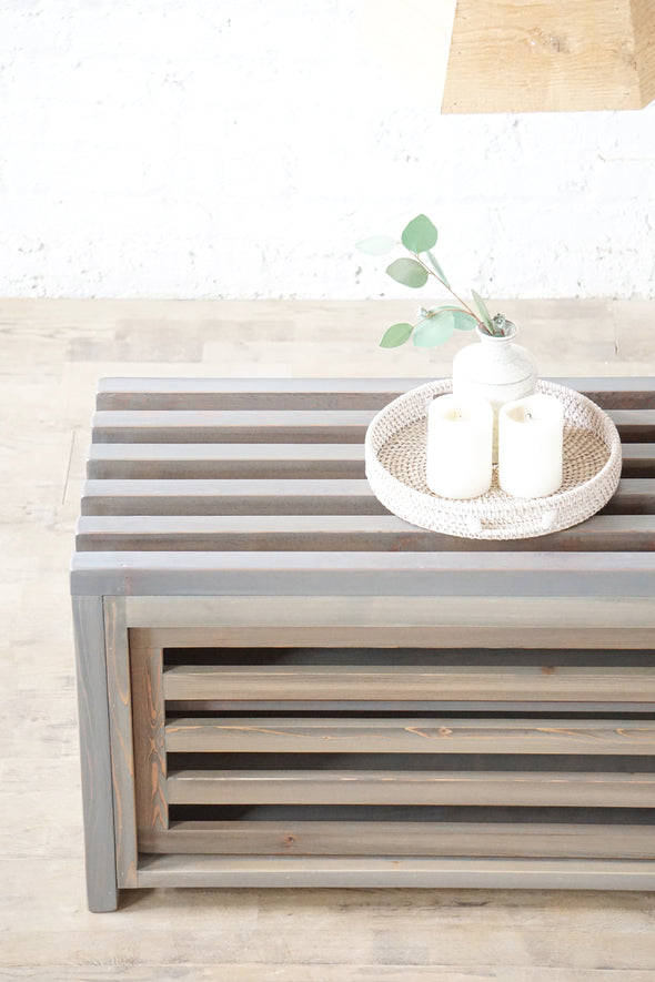 Natural solid wood fluted storage bench. Seating. Shelf. Handcrafted in the USA. Refined rustic design. Modern. Heirloom quality. Sustainably sourced materials. Furniture for home storage.