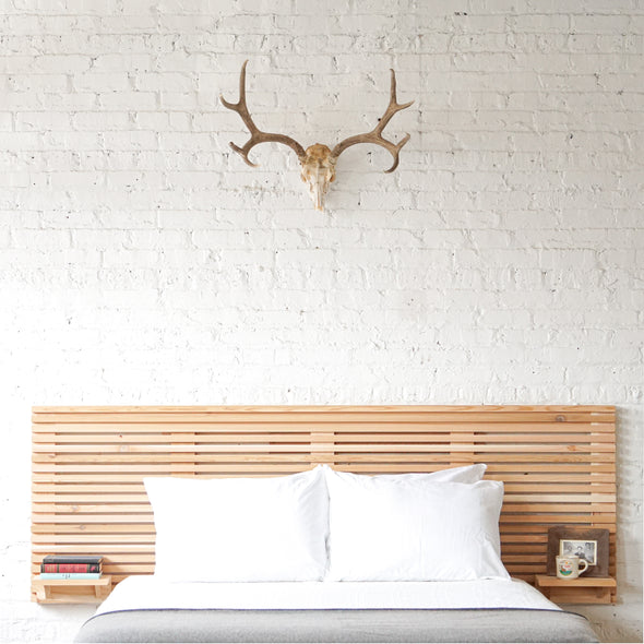Natural solid wood fluted headboard and bed frame. Extended headboard with floating shelves. Handcrafted in the USA. Rustic, modern design. Heirloom quality furniture.