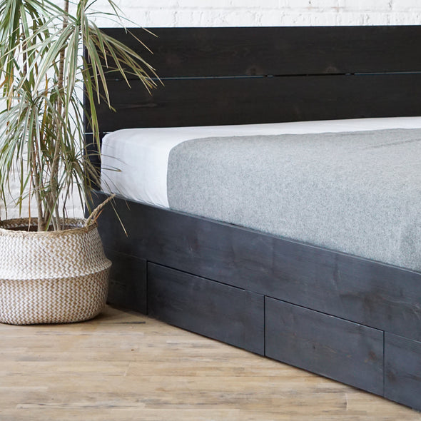 Natural solid wood platform bed frame with storage drawers. Modern, rustic design. Made in the USA. Sustainably sourced materials.