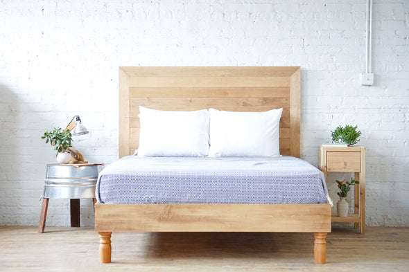 Natural solid wood platform bed frame with spun legs. Vintage style design. Made in the USA. Antique inspired. Heirloom quality furniture.