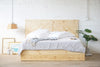 Storage bed. Platform bed frame. Natural solid wood headboard or bed board. Unique and eclectic design. Handcrafted in the USA. Heirloom quality furniture. Sustainably sourced materials. Bedroom furniture. Drawers.