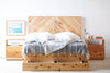 Storage bed. Platform bed frame. Natural solid wood headboard or bed board. Unique and eclectic design. Handcrafted in the USA. Heirloom quality furniture. Sustainably sourced materials. Bedroom furniture. Drawers.