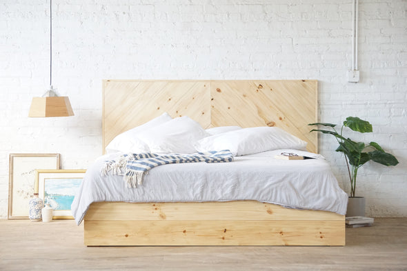 Natural solid wood platform bed frame with storage drawers and without a headboard. Modern, rustic design. Made in the USA. Sustainably sourced materials.