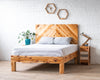 Natural solid wood platform bed frame. Made in the USA. Chevron pattern headboard. 