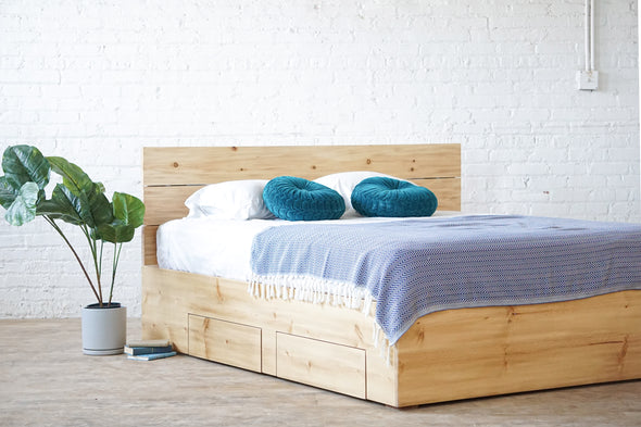 Natural solid wood platform bed frame with storage drawers. Modern, rustic design. Made in the USA. Sustainably sourced materials.