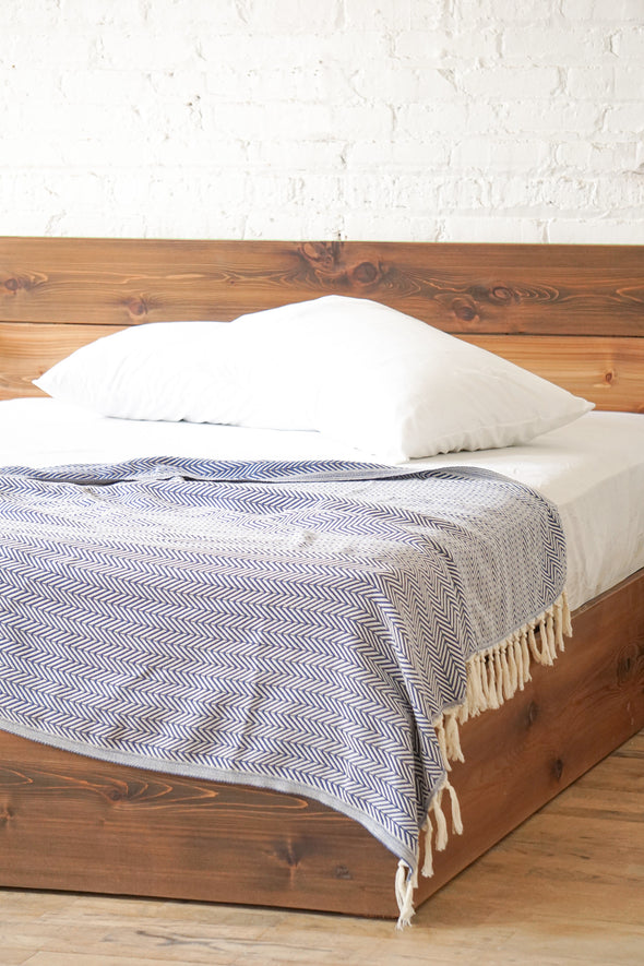 Natural solid wood platform bed frame. Modern, rustic design. Made in the USA. Sustainably sourced materials.