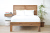 Natural solid wood fluted headboard and bed frame. Handcrafted in the USA. Rustic, modern design. Heirloom quality furniture.