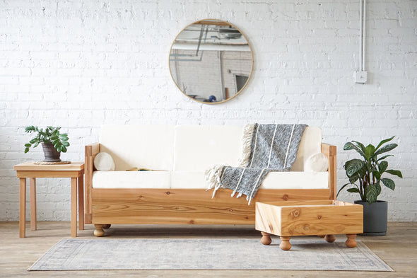 Natural solid wood sofa or couch. Handcrafted, modern, rustic design with American made fabric and hand sewn cushions. Organic cotton. American farmed and American spun cotton. Made in the USA. Sustainably sourced materials.